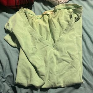 Green v neck shirt